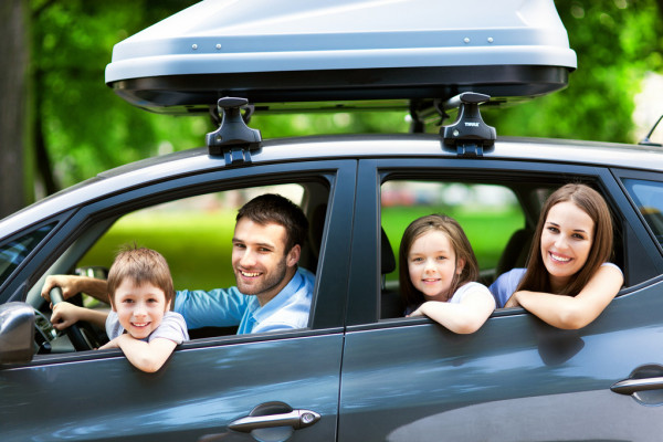 depositphotos_49076389-stock-photo-happy-family-sitting-in-the